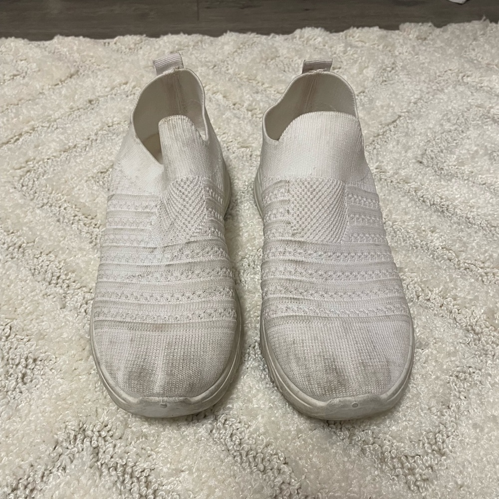 Used white sneakers